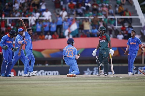 India's Yashasvi Jaiswal (C) celebrates after India's Ravi Bishnoi dismissed Bangladesh's Towid Hridoy (2nd L) during the ICC Under-19 World Cup cricket finals. (Photo | AFP)