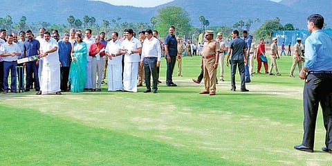 Tamil Nadu CM Edappadi K Palaniswami bats as former India captain Rahul Dravid gives a throwdown at the Salem Cricket Foundation ground, which was inaugurated on Sunday. (Photo | EPS)