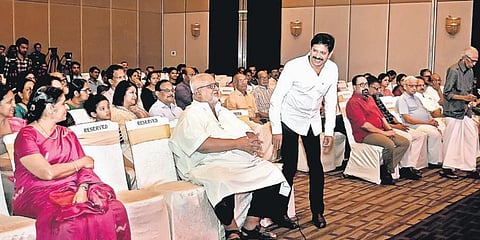 Magician Gopinath Muthukad shares a light moment with screenplay writer John Paul at the special screening of ‘Gopinath Muthukad: 45 years of magic’ in Kochi on Sunday. Actress Vidhubala, filmmaker Sibi Malayil, writer MK Sanoo, PT Thomas, MLA, former MP 