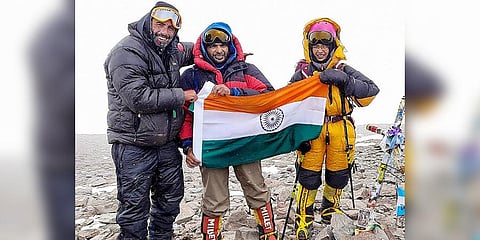 Kaamya Karthikeyan, a class 7 student of Navy Children School, unfurls the Indian Tricolour at Mt Aconcagua, the highest peak in South America.  (Photo | Twitter)