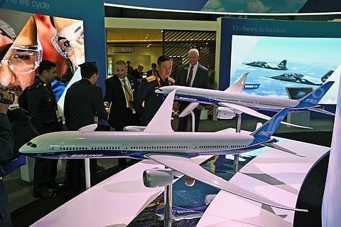 Boeing 777 and 787 airplane models are exhibited at the Singapore Airshow in Singapore on February 11, 2020.  (Photo | AFP)