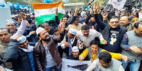 AAP workers celebrate at party office in New Delhi on Tuesday. (Photo | Shekhar Yadav, EPS)