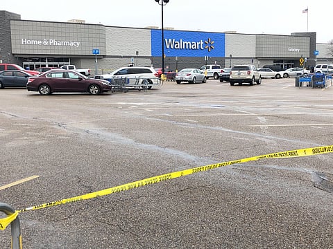 Police tape blocks off a Walmart store parking lot in Forrest City, Arkansas. (Photo | AP)