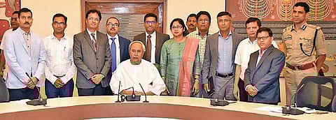 Chief Minister Naveen Patnaik with the team of cadaver transplant doctors at  Loka Seva Bhawan in Bhubaneswar on Monday | Express