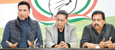 Congress spokesperson Randeep Singh Surjewala (L) addresses a press conference during the counting of votes. (Photo | PTI)