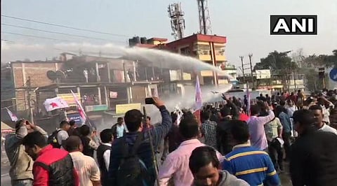 Police used water cannon to disperse the protesting DYFI activists. (Photo | ANI Twitter)