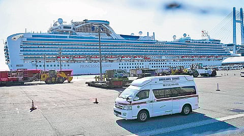 The Diamond Princess cruise ship, with around 3,600 people quarantined at Yokohama port on Tuesday; (inset) an Indian onboard | AFP