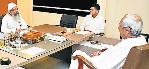 Union Minister Pratap Sarangi interacting with Chief Minister Naveen Patnaik at Loka Seva Bhavan. Also seen is 5T Secretary VK Pandian | Express
