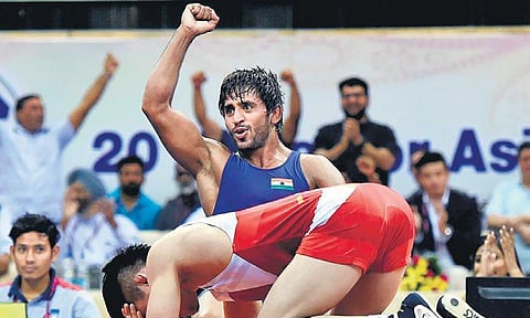 Bajrang Punia’s coach says the wrestler tends to lose concentration during bouts