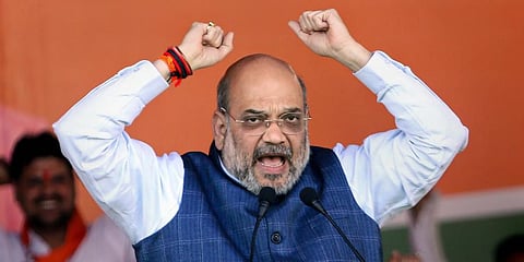 Union Home Minister Amit Shah addresses during the merger of Jharkhand Vikas Morcha Prajatantrik party with the BJP at Jagannathpur area of Ranchi. (Photo | PTI)