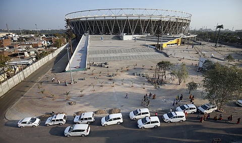 Police and government officials' convoy cars being parked inside Sardar Patel stadium, where US President Donald Trump is expected to visit during his upcoming trip to India, in Ahmedabad. (File photo| ANI)