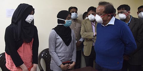 Union Minister of Health and Family Welfare Harsh Vardhan interacts with students who were air-lifted from Wuhan, in New Delhi.(Photo | Parveen Negi, EPS)
