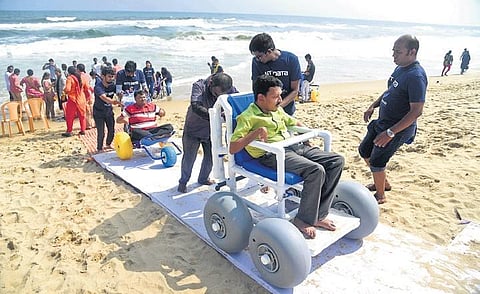 File picture of physically challenged person using ramp to enter Marina Beach   | Express