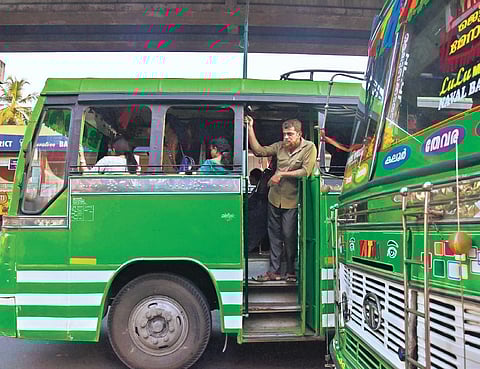 Despite the HC verdict stipulating doors be made mandatory in private buses, several buses continue to ply with open doors in the city | Albin Mathew