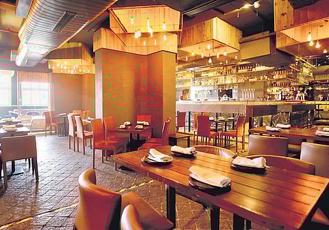 The cafe lives up to every word of its name: there’s mithai, there’s apple, there’s custard, and there’s a whole lot of Farzi.