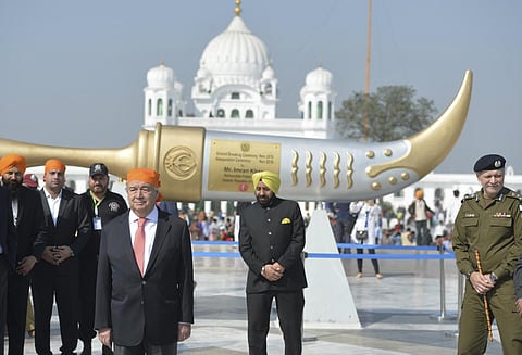 U.N. Secretary General Antonio Guterres, fourth left, stands before the Sikh Gurdwara Darbar Sahib, in Kartarpur, Pakistan, Tuesday, Feb. 18, 2020. (Photo | AP)