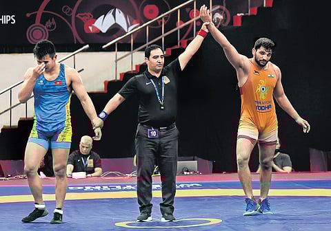 India’s Sunil Kumar celebrates after his win against Kyrgyzstan’s Azat Salidinov in the final in New Delhi on Tuesday (Photo | Parveen Negi, EPS)