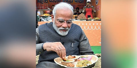 Prime Minister Narendra Modi relishes 'litti-chokha'. (Photo| PMO)