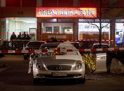 A car with dead bodies stands in front of a bar in Hanau, Germany, Thursday, Feb. 20, 2020. German police say several people were shot to death in the city of Hanau on Wednesday evening. (Photo | AP)