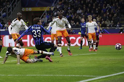 Atalanta's Hans Hateboer (33) scores his side's opening goal during the Champions League round of 16, first leg match against Valencia. (Photo | AP)