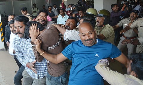 Kashmiri students being roughed up outside the court premises in Hubballi. (File Photo| EPS/ D Hemanth)