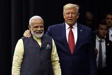 In this photo from Feb. 14, 2025, Prime Minister Narendra Modi and US President Donald Trump shake hands as they deliver a joint press statement after their meeting at the White House, in Washington, DC.