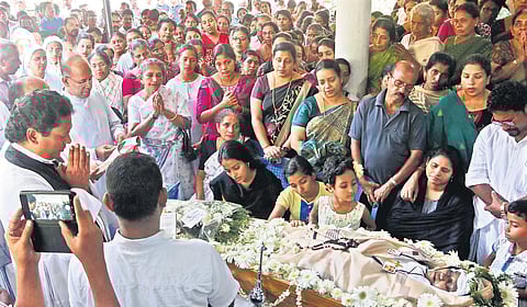 Public and well-wishers who gathered at the house of Rosily, who died in the accident at Avinashi, at Shanthi Nagar in Chandranagar, Palakkad, on Friday | Express