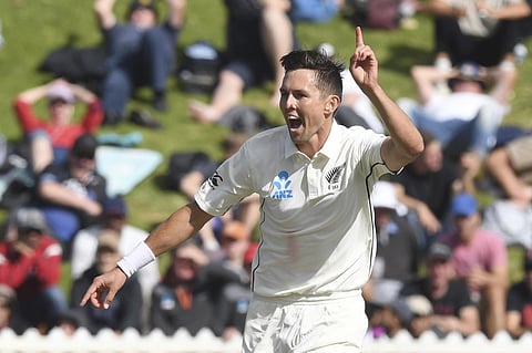 New Zealand's Trent Boult celebrates bowling India's Cheteshwar Pujara. (Photo | AP)