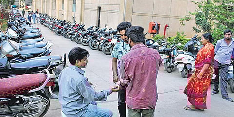 Vijayawada malls still collect parking fees, flout court order