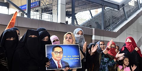Women during a sit-in protest against CAA, NRC and NPR at Jaffrabad in New Delhi on Sunday. (Photo| Parveen Negi, EPS)