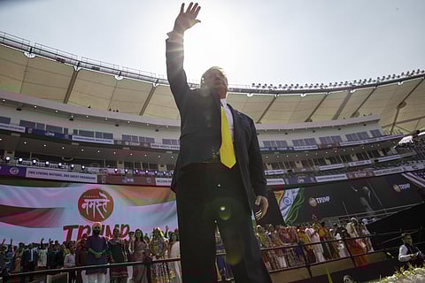 U.S. President Donald Trump waves as he departs after a 'Namaste Trump,' event at Sardar Patel Stadium in Ahmedabad on Monday. (Photo | AP)