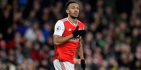 Arsenal's Pierre-Emerick Aubameyang celebrates after scoring his side's third goal during the English Premier League soccer match between Arsenal and Everton at Emirates stadium in London. (Photo | AP)