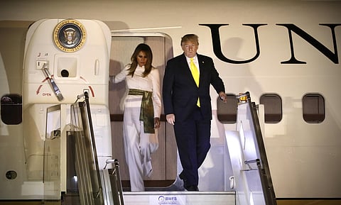 U.S. President Donald Trump, with first lady Melania Trump, prepare to disembark from Air Force One, upon arrival at the airport in New Delhi, India, Monday, Feb.24, 2020. (Photo | AP)