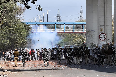 Anti-CAA protesters and police clash at Jafrabad in north-east Delhi on Monday. (Photo | Parveen Negi/EPS)