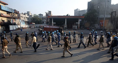 Security personnel conduct flag march during clashes between those against and supporting the Citizenship Amendment Act in north east Delhi Tuesday Feb. 25 2020. (Photo | Shekhar Yadav/EPS)