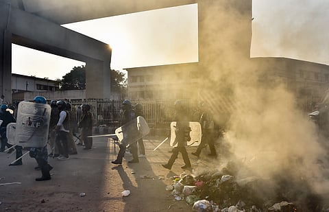 Security personnel conduct flag march during clashes between those against and those supporting the Citizenship (Amendment) Act in north east Delhi, Tuesday, Feb. 25, 2020. (Photo | PTI)