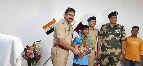 DIG (South Western) Safeen Ahmad K with the Maoist Kamlyu. (Photo| EPS)