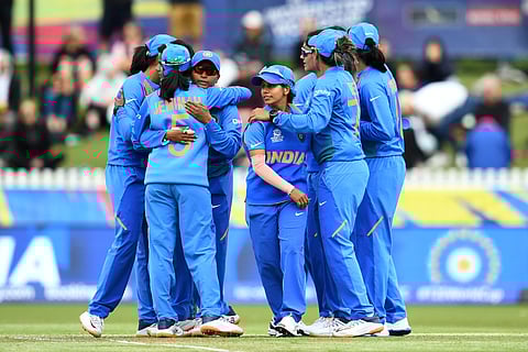 India's players celebrate after victory against New Zealand during the Twenty20 women's World Cup cricket match between New Zealand and India in Melbourne on February 27, 2020. (Photo | AFP)
