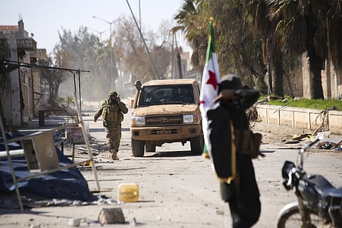 Turkish backed Syrian rebels enter the own of Saraqeb, in Idlib province, Syria, Thursday, Feb. 27, 2020. Turkey-backed Syrian opposition fighters Thursday retook a strategic northwestern town iof Saraqeb, opposition activists said, and cut off the key hi