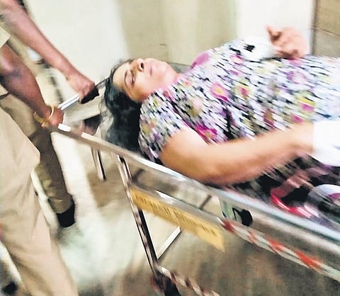 Jollyamma, prime accused in the Koodathayi serial murder case, being taken to hospital following her suicide attempt on Thursday | Express