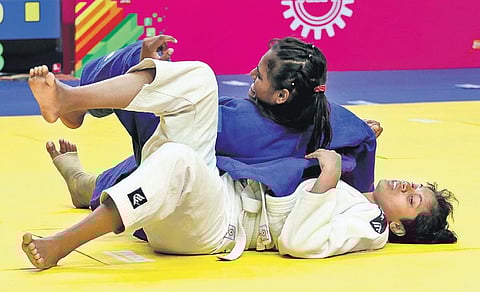 CP Krishna (below) of MGUK in action against Hema Gopal Maliye at the Khelo India University Games 2020 in Bhubaneswar on Thursday. (Photo| EPS/Irfana)