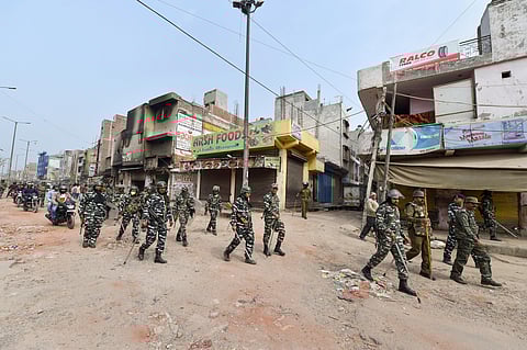 Security personnel patrol streets following Tuesday's violence over new citizenship law at Khajuri Khas area of northeast Delhi. (Photo | PTI)