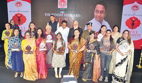 MP Chief Minister Kamal Nath and The New Indian Express Group Editorial Director Prabhu Chawla with the women honoured with Devi Awards in Indore on Friday | Express