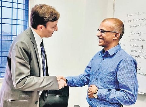 AFD country director Bruno Bosle with Energy secretary Srikant Nagulapalli in Vijayawada on Sunday I Express