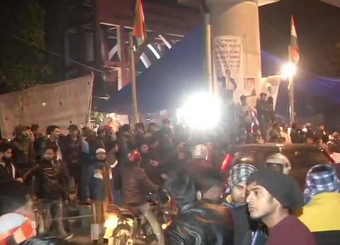 Crowd gathers outside Jamia Millia Islamia University. (Photo | ANI)