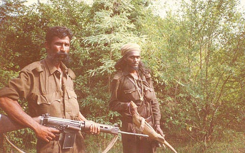 Slain smuggler Veerappan (L) (File | EPS)