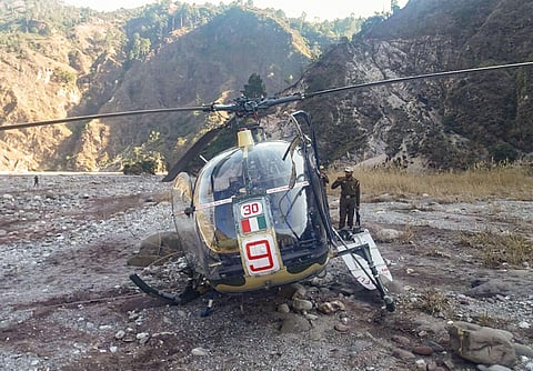 A Chetak helicopter of the Indian Army which crash landed following a technical snag in Reasi district of Jammu and Kashmir Monday. (Photo | PTI)