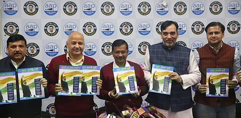 Delhi CM Arvind Kejriwal, dy CM Manish Sisodia and AAP leaders Sanjay Singh and Gopal Rai release the party manifesto in New Delhi. (Photo| Shekhar Yadav, EPS)