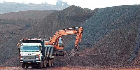 A lorry and an earth-mover at a mining site. (Image used for representational purpose only)