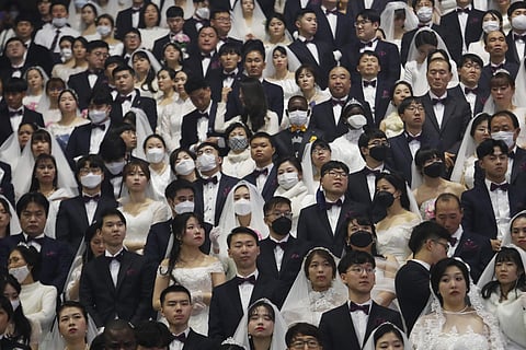 Couples from around the world attend a mass wedding ceremony at the Cheong Shim Peace World Center in Gapyeong, South Korea. (Photo | AP)